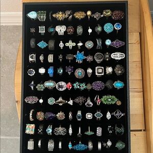 100 solid Sterling Silver rings, all stamped 925. Happy to separate